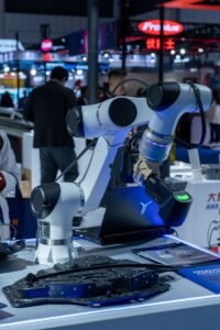 Close-up of advanced robotic arms at a technology expo showcasing automation and innovation.